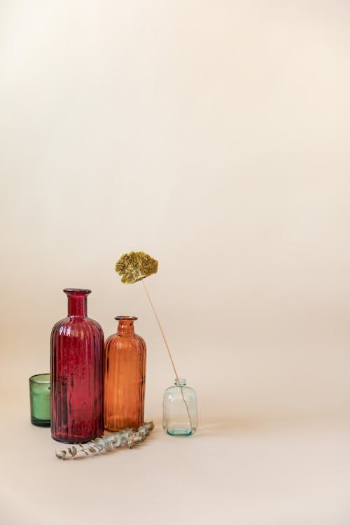 Clear Glass Bottle With Yellow Flower