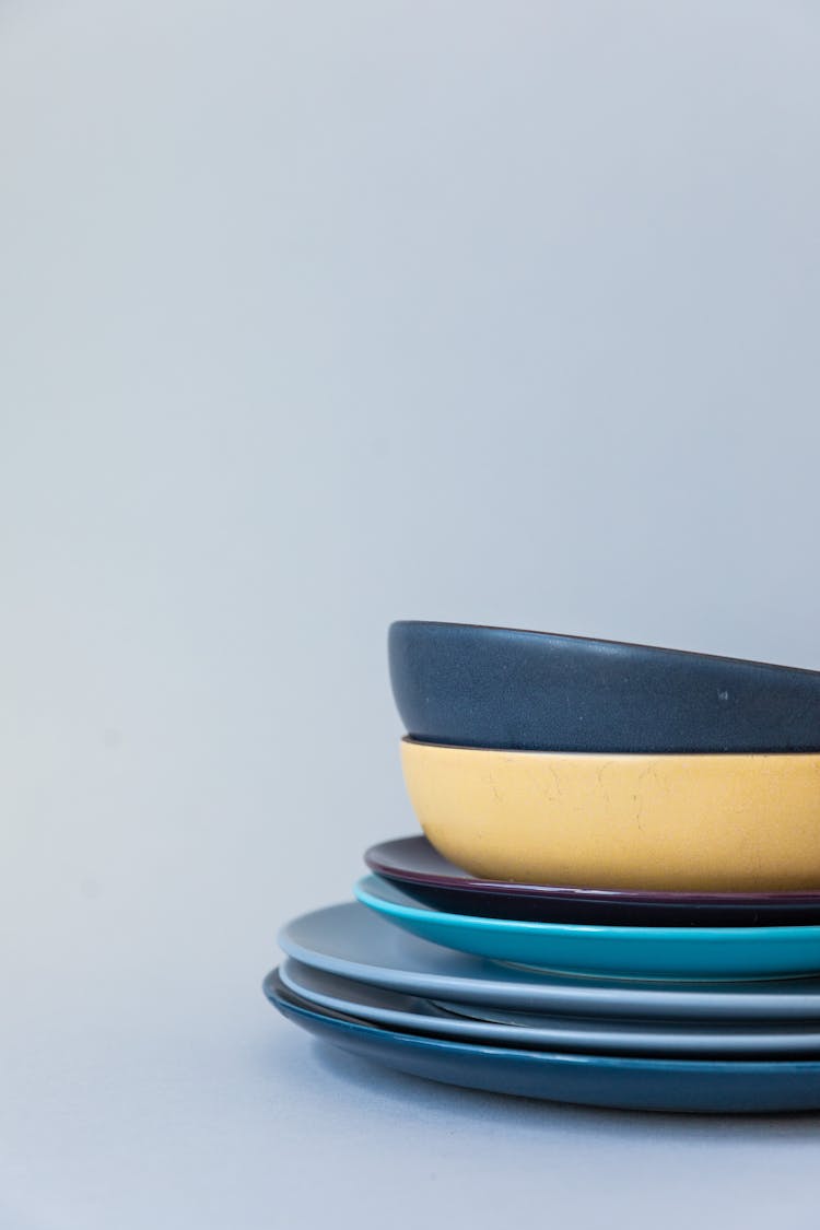 Stack Of Plates And Ceramic Bowls