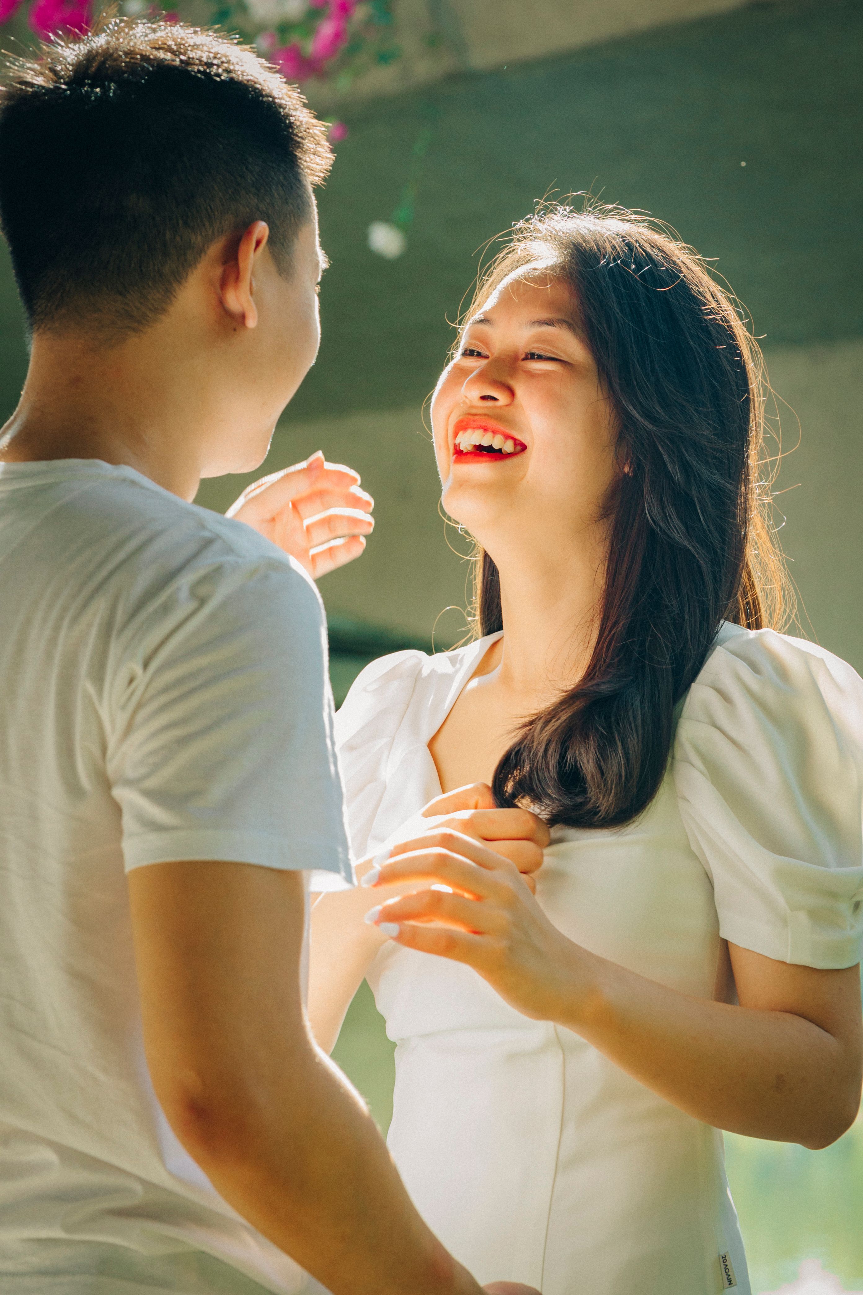 Man in White T-shirt Kissing Woman in White Dress · Free Stock Photo
