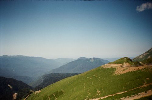 Free Explore the lush green hills and distant mountain ranges of Sochi, Russia. Stock Photo