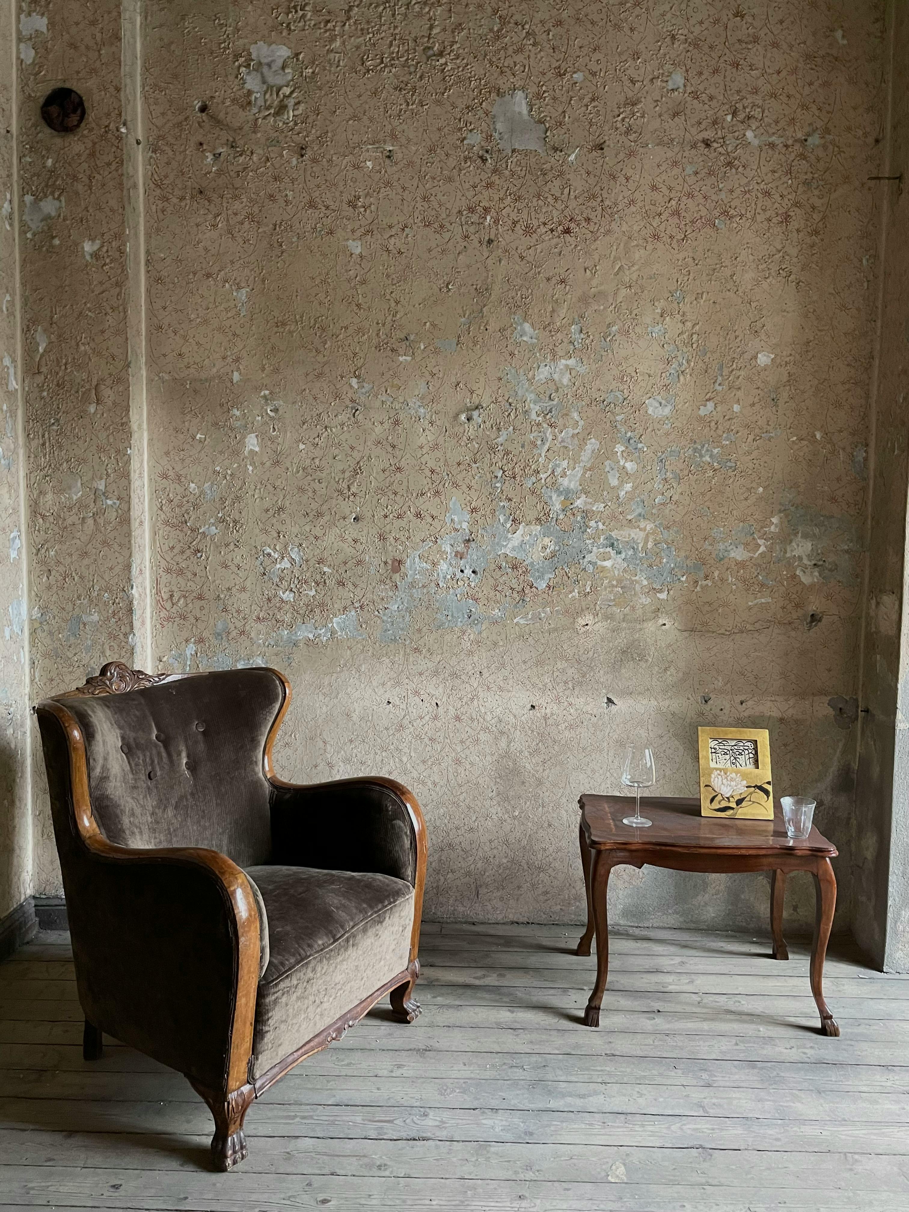 Old Armchair and a Table Free Stock Photo