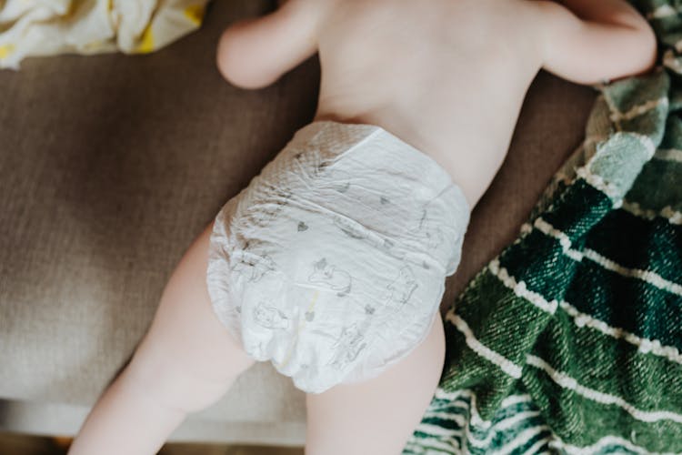 Close Up Photo Of A Baby Wearing Diaper