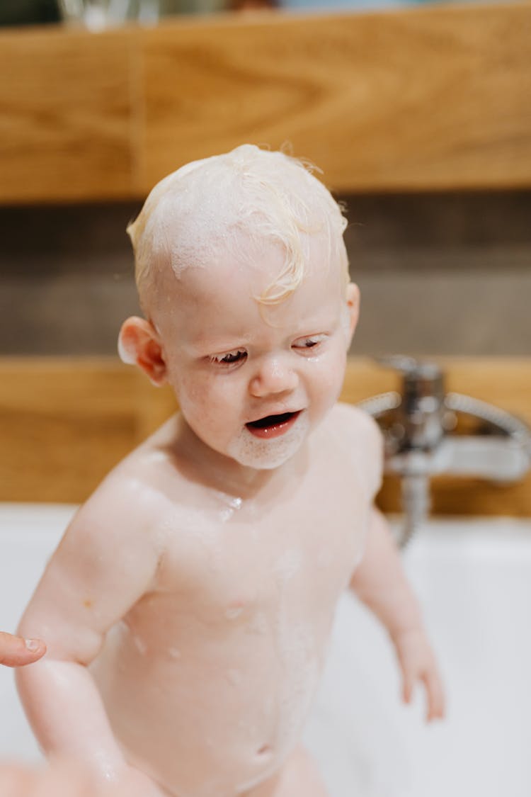 A Cute Baby In Bathtub 