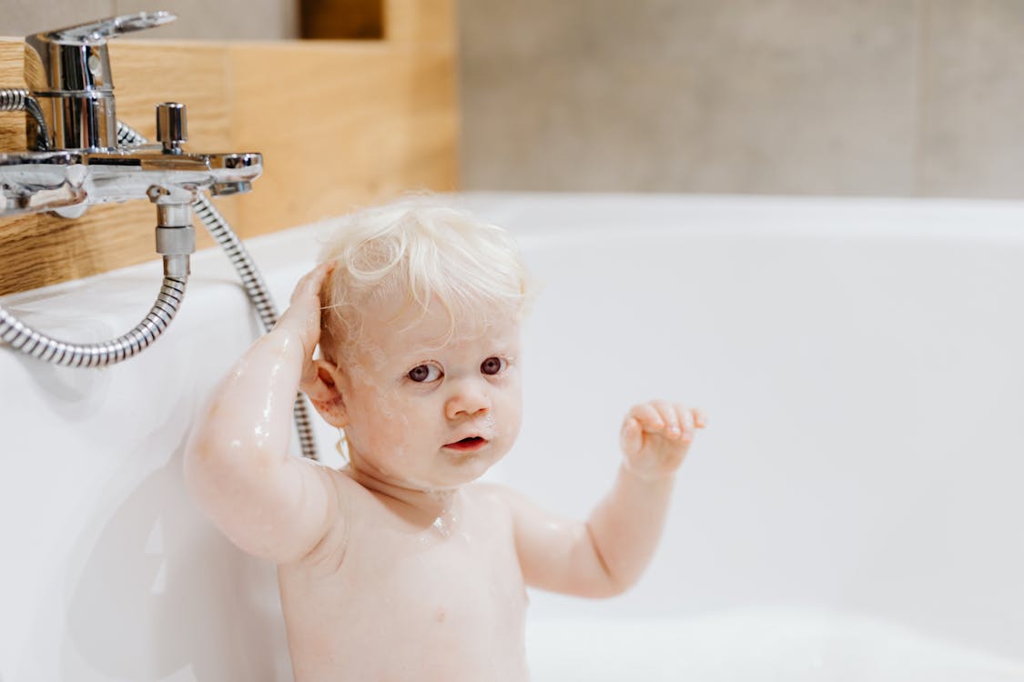 Free A Child in the Bathtub Stock Photo