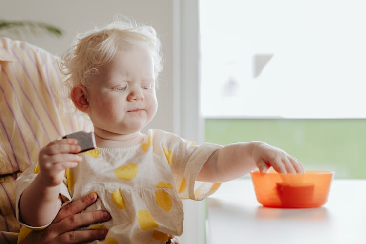 Photo Of A Child Eating Food