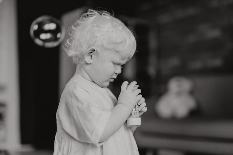 Grayscale Photo Of Toddler