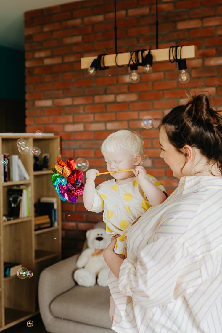 Woman Carrying Child