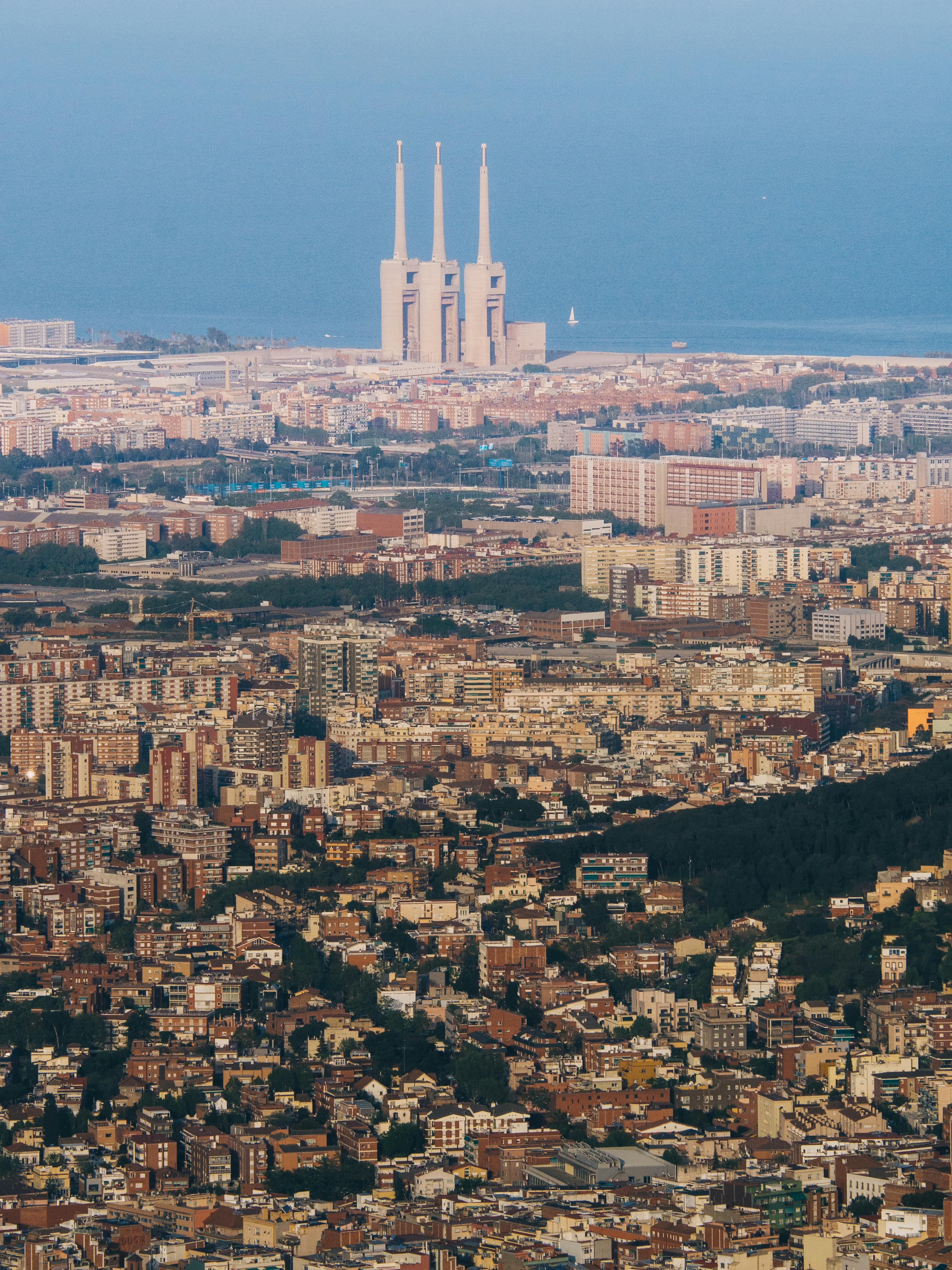 aerial view of city buildings under blue sky