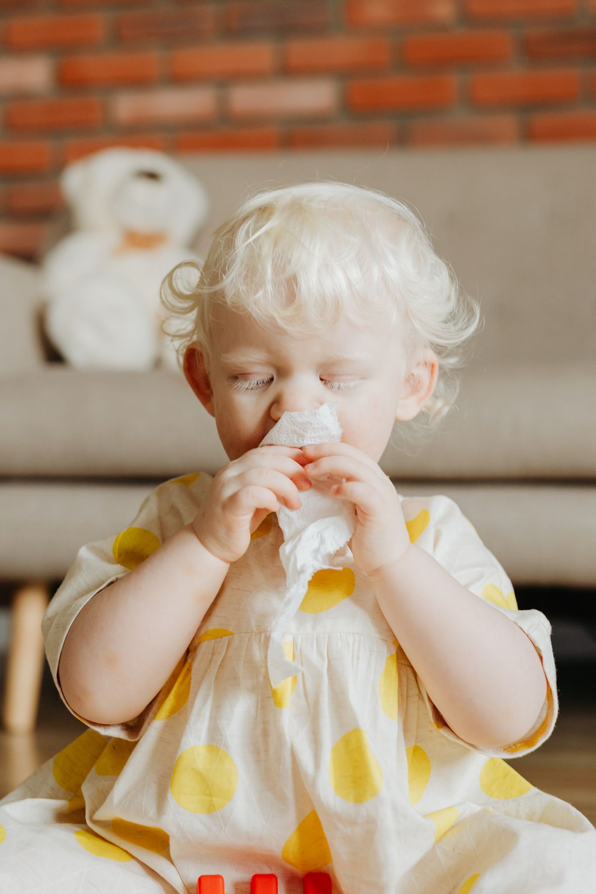 Young infant showing signs of respiratory distress and wheezing