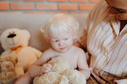 Close-Up Shot of a Topless Baby