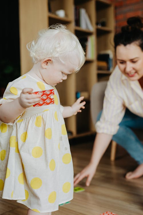 A Young Girl Playing at Home