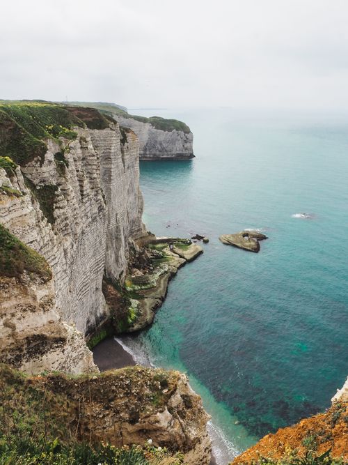 Free Stunning cliffs overlooking the turquoise sea in Normandy, showcasing natural wonder. Stock Photo