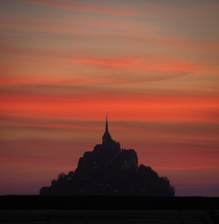 Silhouette of an Abbey in an Island during Sunset