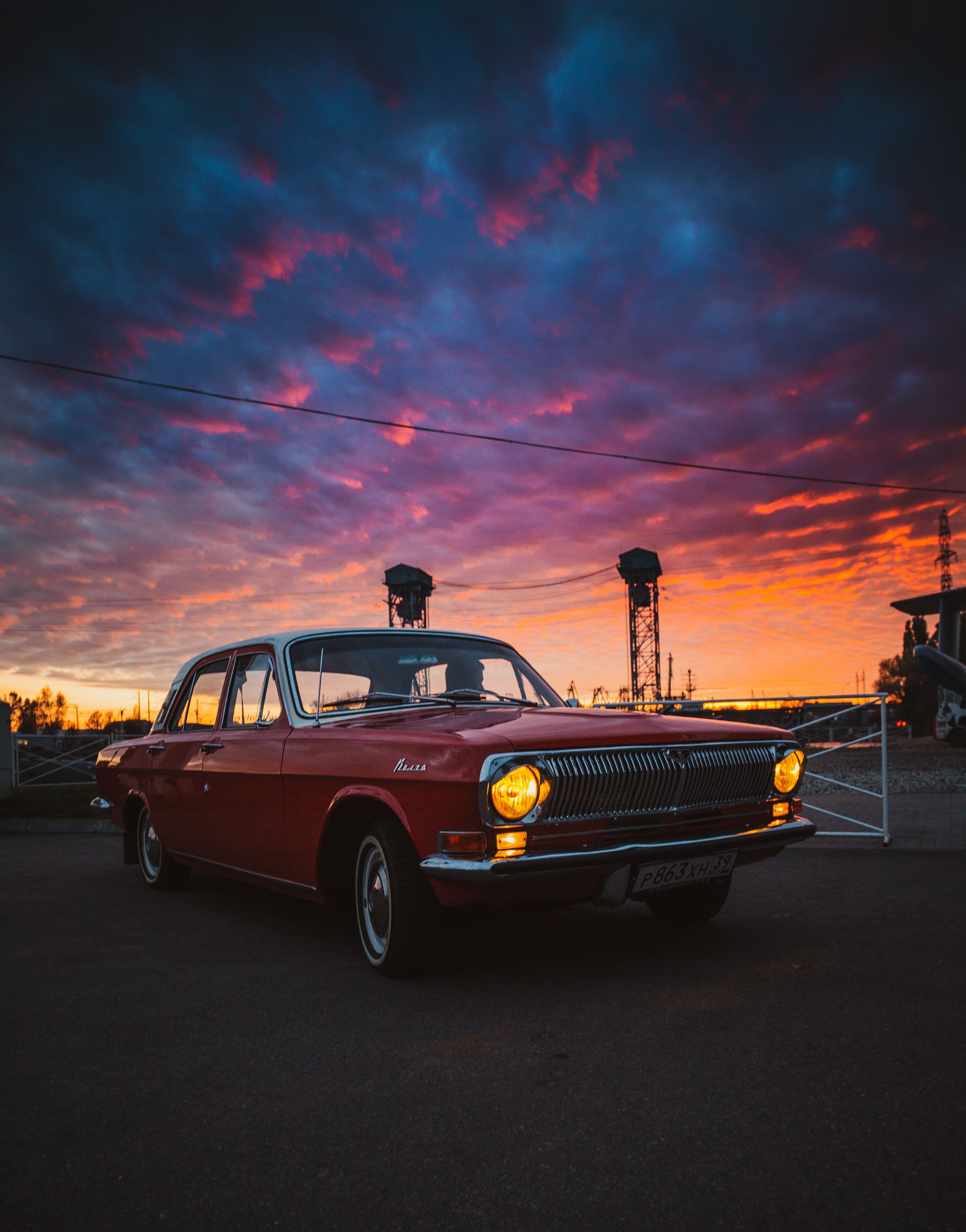 A Red Vintage Car Parked on the Road · Free Stock Photo