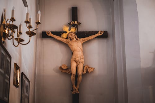 Free The Crucifix of Jesus Hanging in the Wall Stock Photo