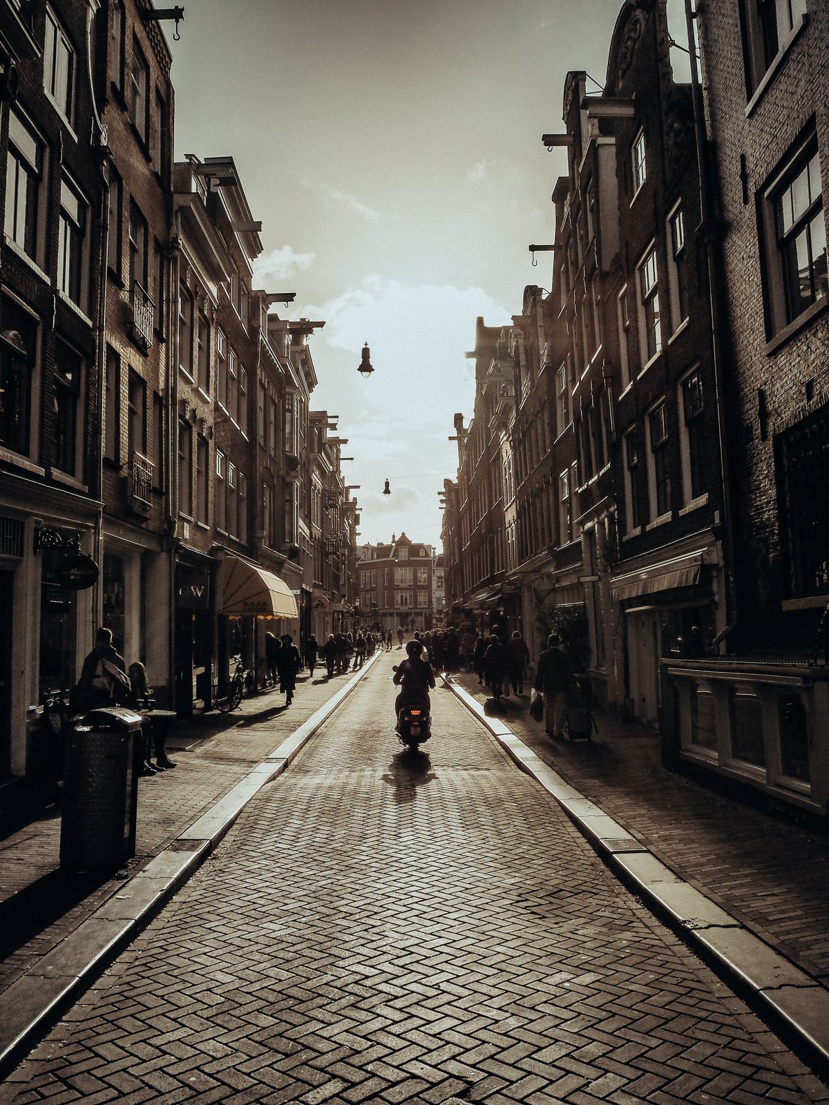 Busy street with lots of people walking