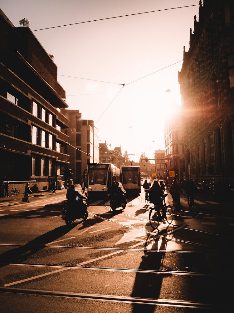 Busy Intersection In City At Sunset