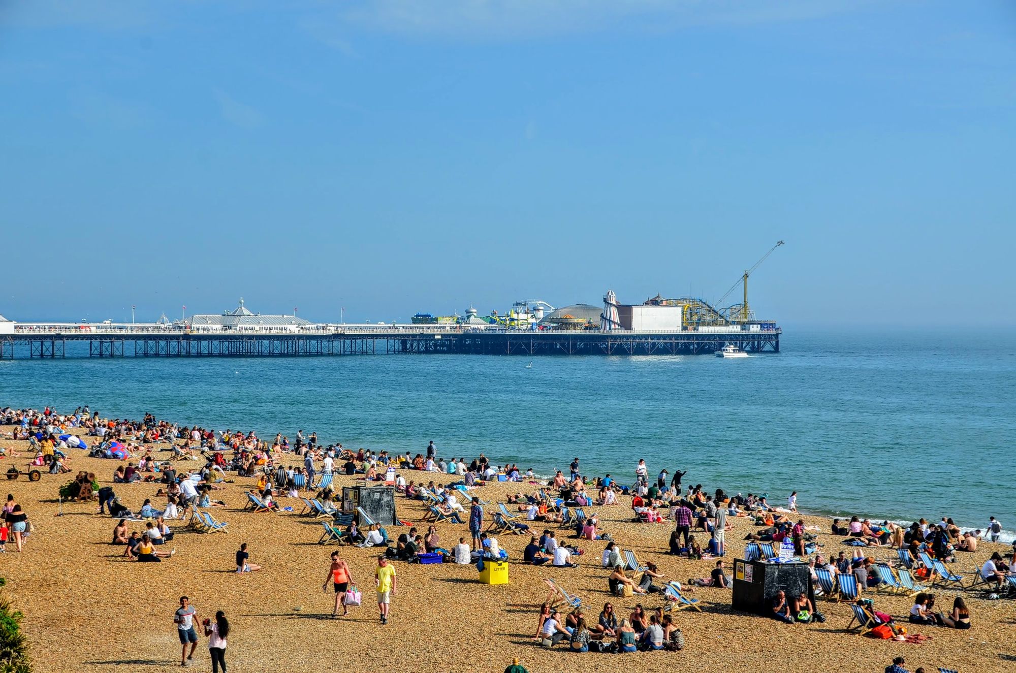 Brighton beach and pier Brighton pebble beach and Palace Pier on the Brighton and Hove seafront