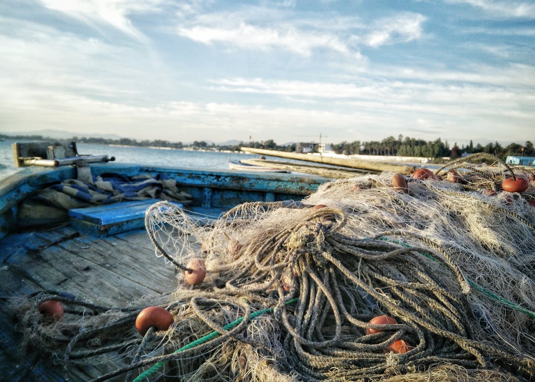 A fishing Net Piled up on a boat