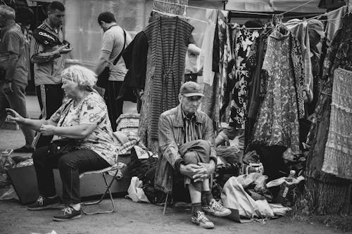 People Selling Clothes on Street Market