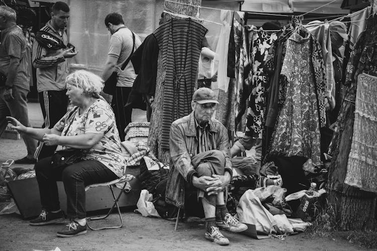 People Selling Clothes On Street Market