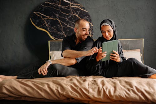 A Couple using a Tablet 
