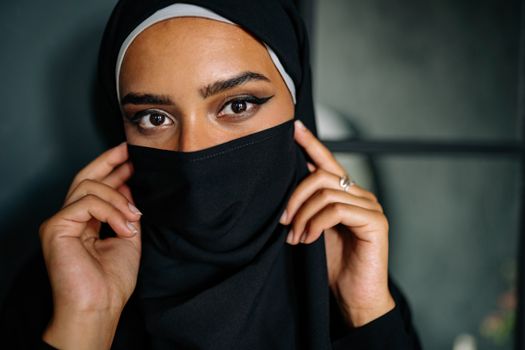 Woman in Black Hijab Covering Her Face