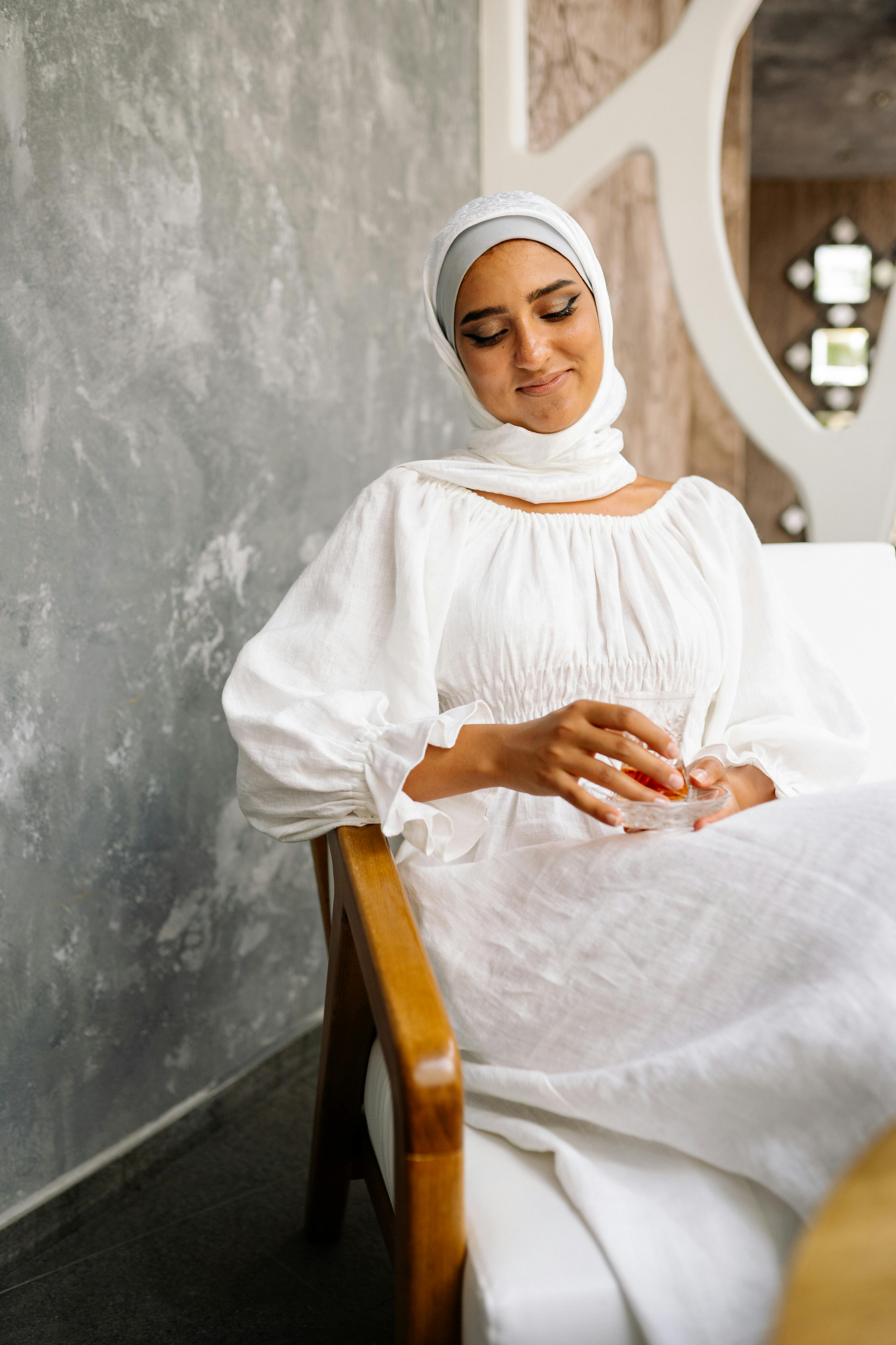 Woman in White Dress Wearing White Hijab · Free Stock Photo