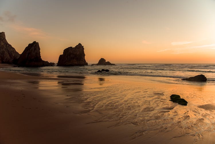 A View Of The Beach During Sunset 