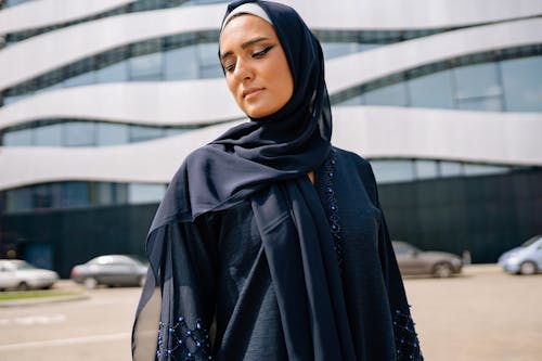 Free Woman in Black Hijab Looking Over Her Shoulder  Stock Photo