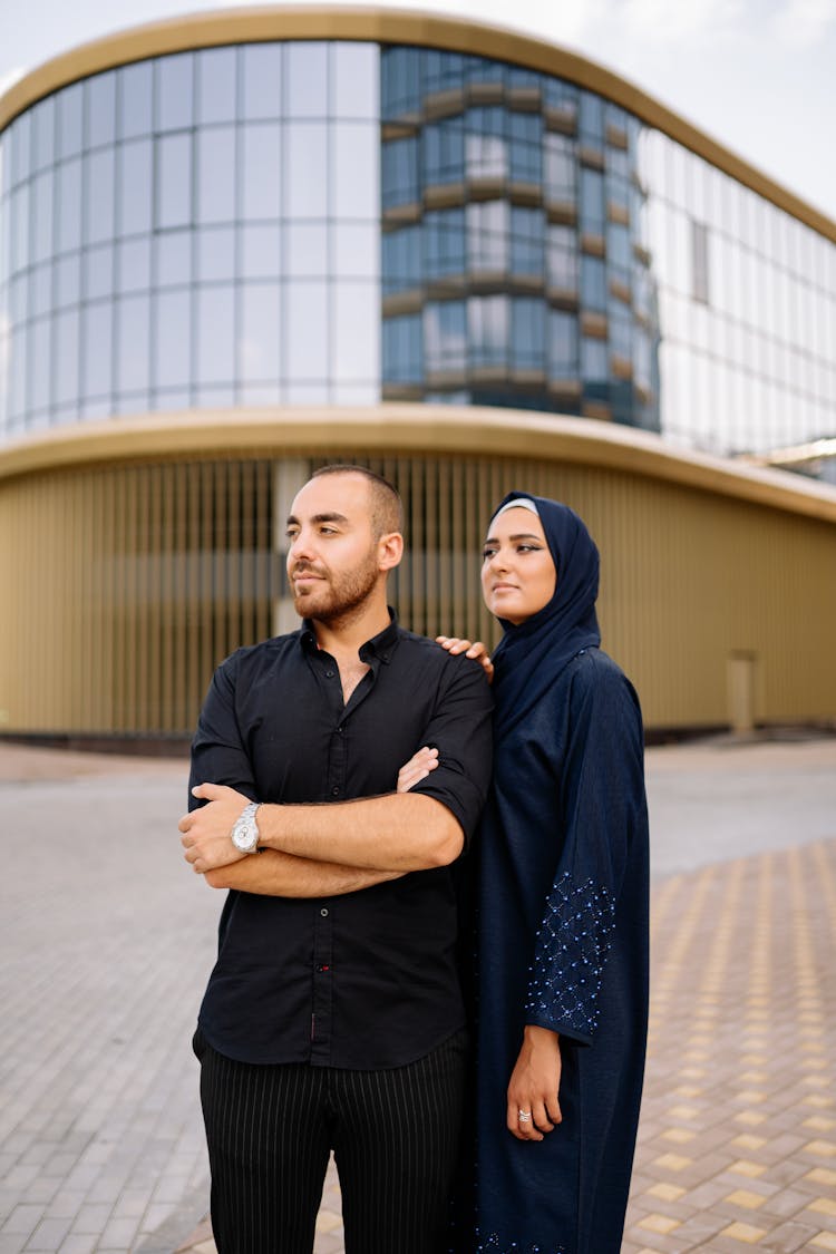 Romantic Couple Standing Near Building