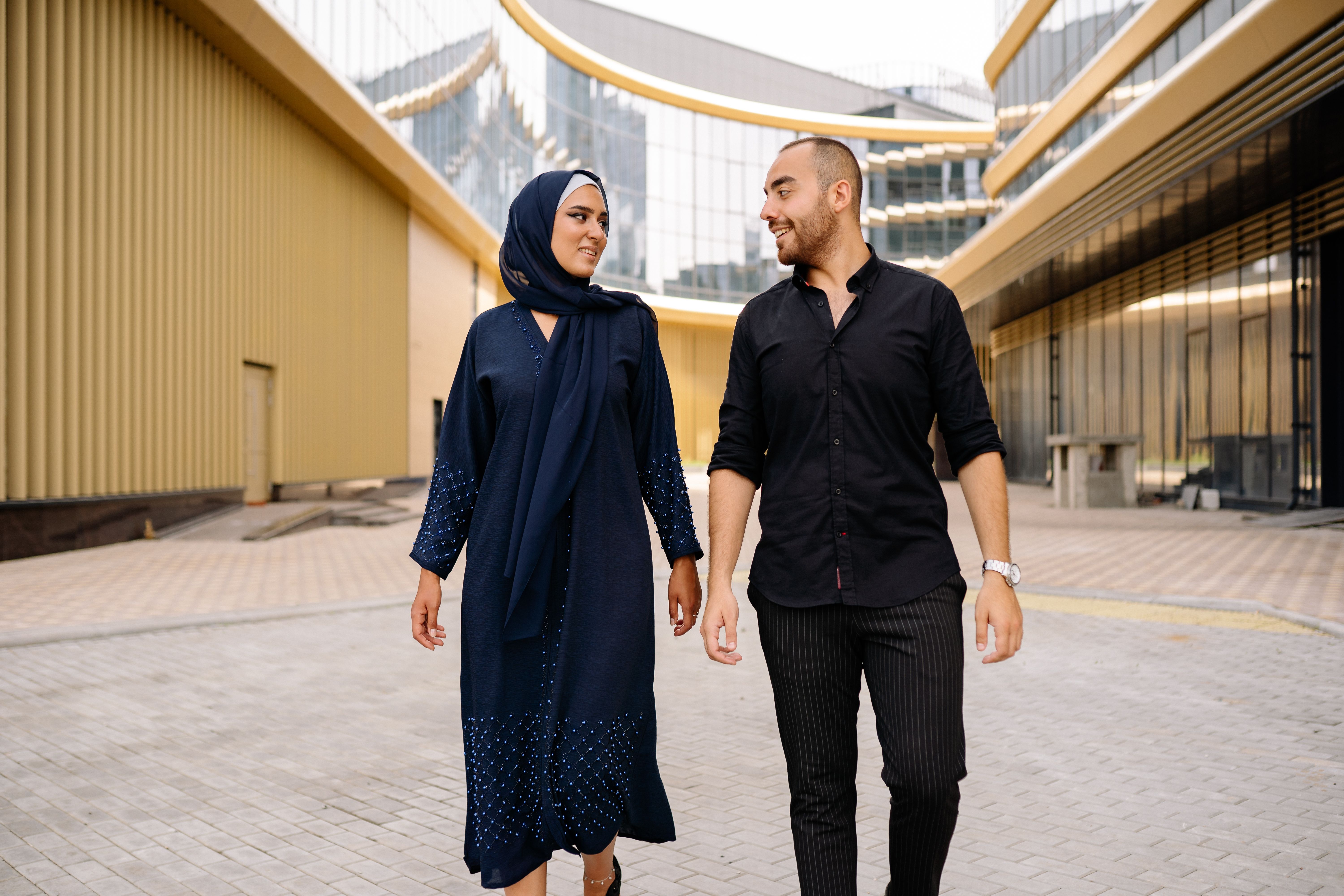 Woman in Blue Dress Standing Beside a Man · Free Stock Photo