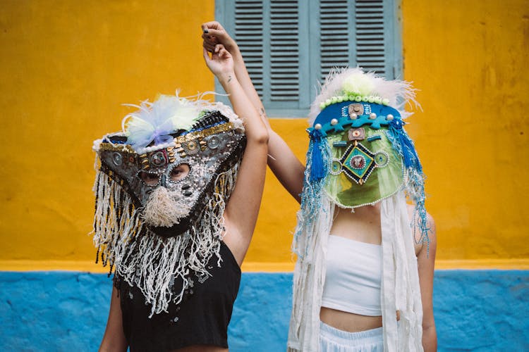 Women Wearing Festival Masks