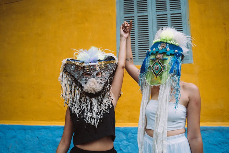 Women Wearing Festival Masks