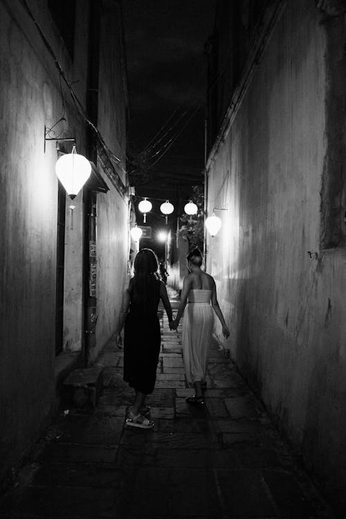 Free Women Walking on the Street Stock Photo