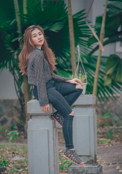 Woman Wears Black and White Checkered Sport Shirt