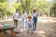 A Family having a Picnic at the Park