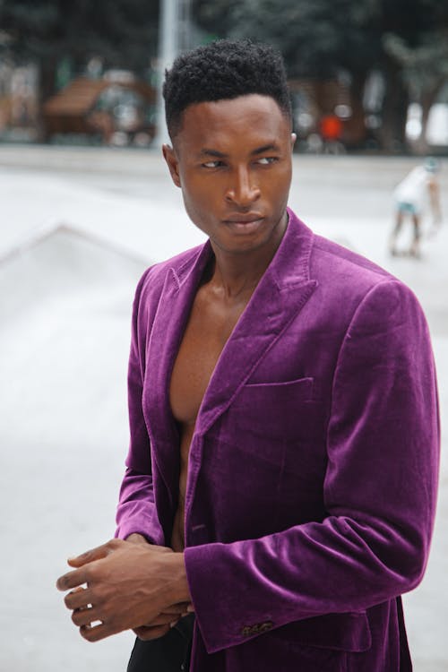 A Person in Purple Blazer and Black Pants