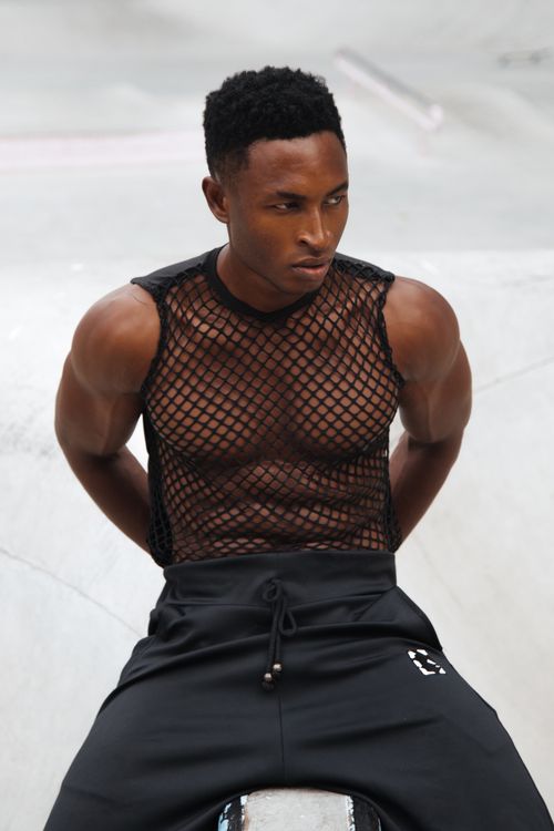 Man in Black Tank Top and Black Pants · Free Stock Photo