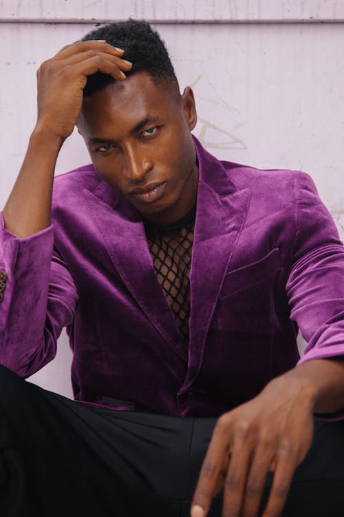 Close-Up Shot of a Man Wearing His Violet Suit