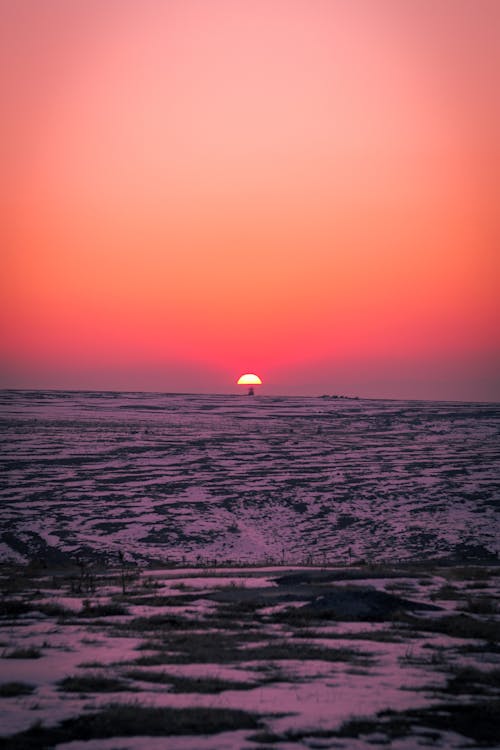 Sunset on Clear Sky over Plains in Winter