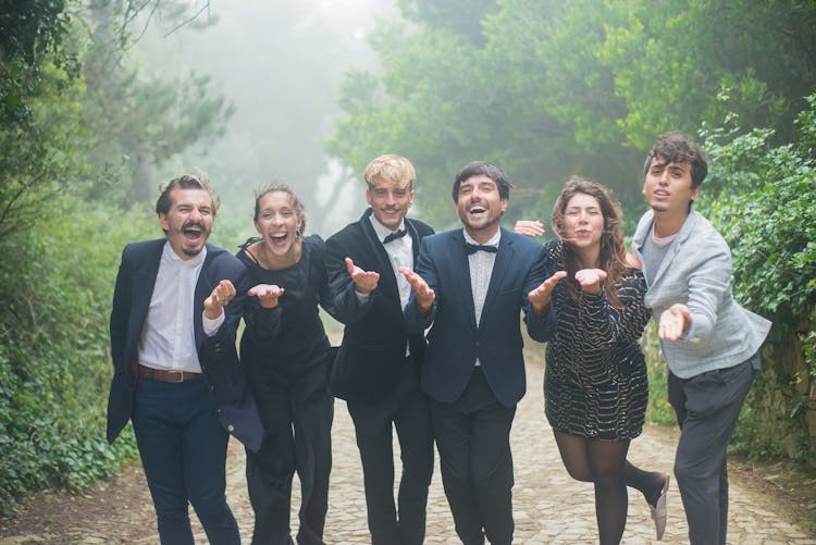 Group Of People Sending Flying Kiss 