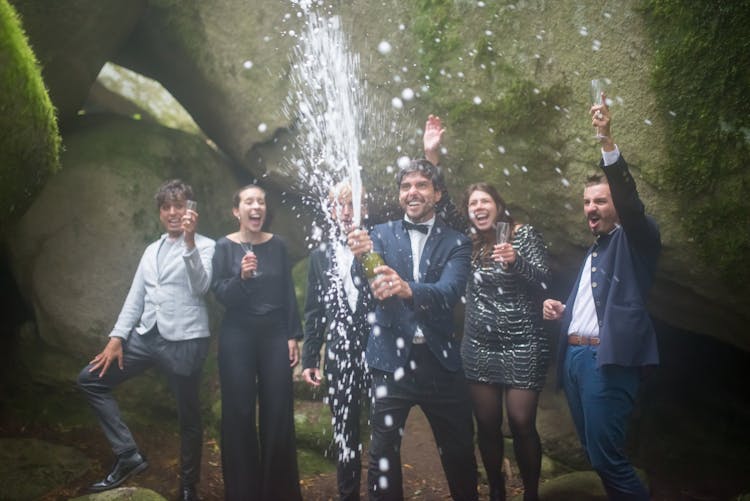 Man Opening A Bottle Of Champagne 