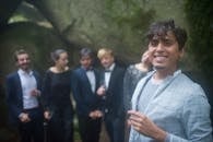 Smiling Man in Baby Blue Blazer