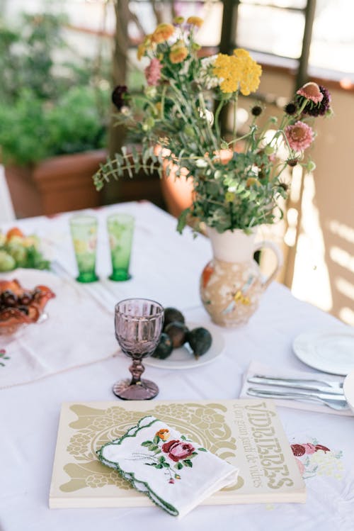 A Book over a Table Covered with Cloth