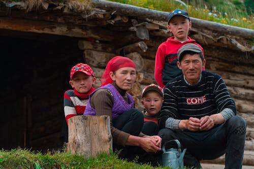 Family outside of their House 