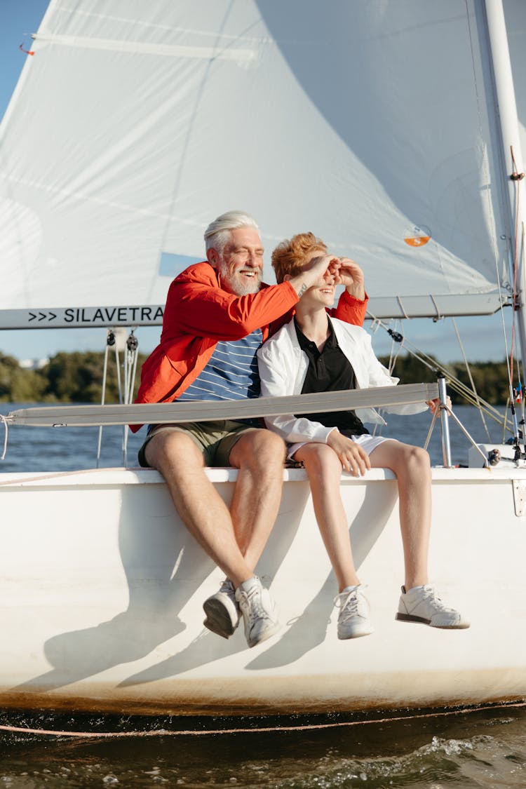 A Grandfather And A Grandson On A Boating Adventure