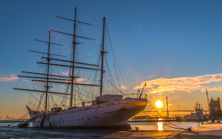 White Ship In Dock During Golden Hour