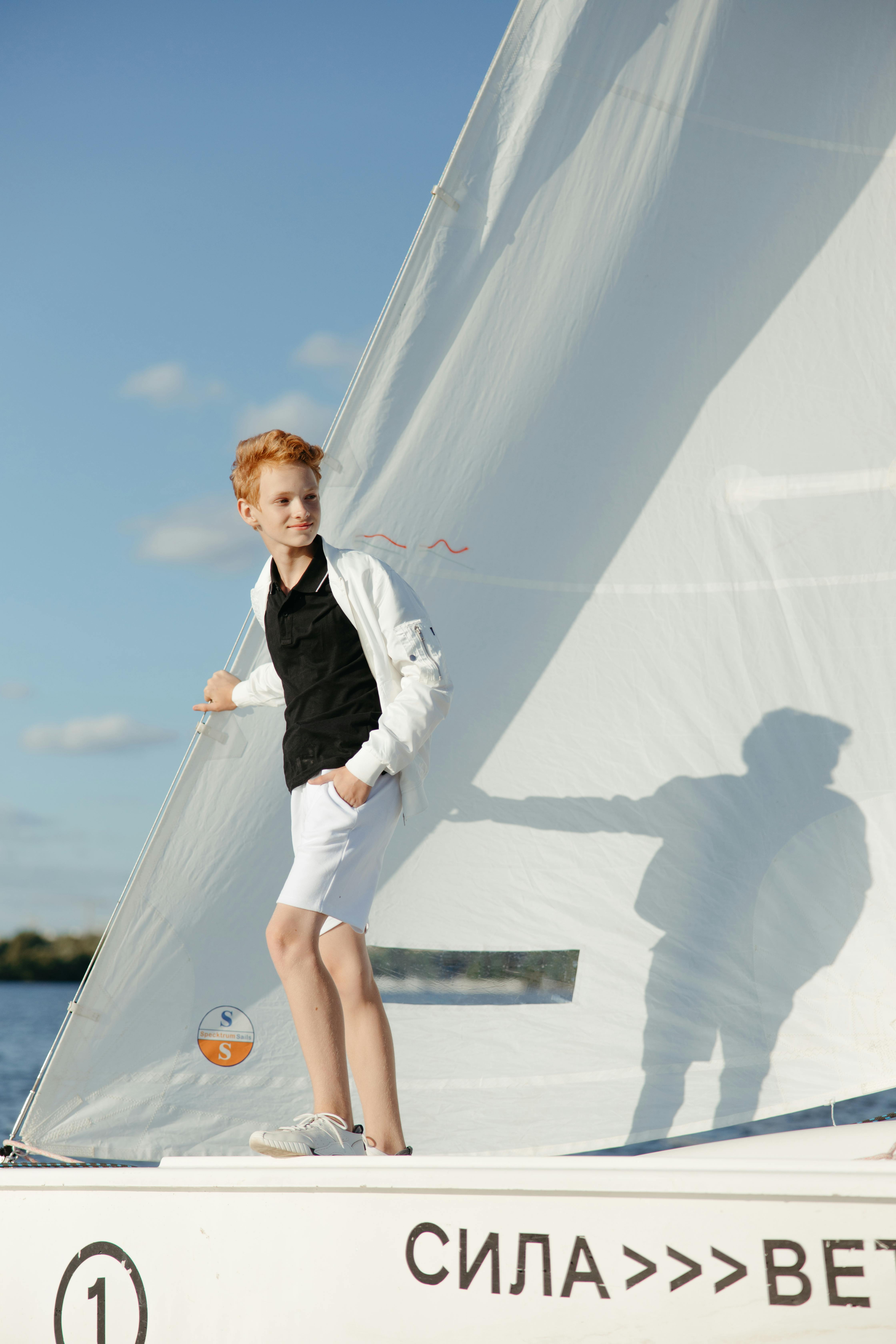 teenage boy on a boat