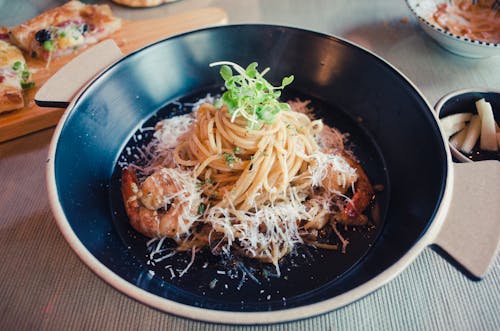 Shrimp Pasta in Black Ceramic Plate